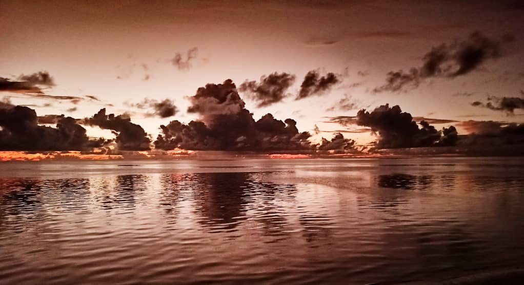 Sunrise over Pongwe Beach — the site in operation