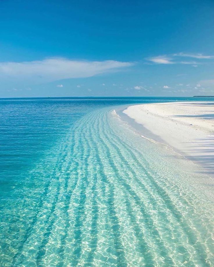 Clear shallows over white sand, east coast Zanzibar